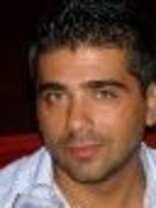 Person who looks like John Stamos