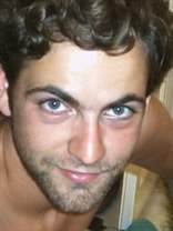 Person who looks like Tim Curry