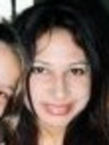 Person who looks like Gloria Estefan