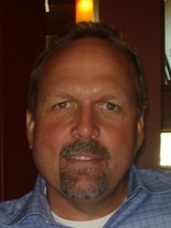 Person who looks like John Ratzenberger