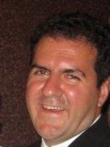 Person who looks like Simon Cowell