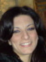 Person who looks like Gloria Estefan