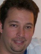 Person who looks like Tim Curry