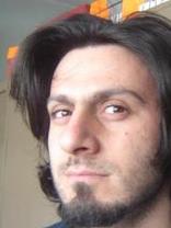 Person who looks like Jason Schwartzman