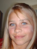 Person who looks like Mary-Kate and Ashley Olsen