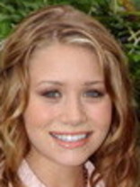 Person who looks like Mary-Kate and Ashley Olsen