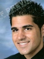 Person who looks like Mario Lopez