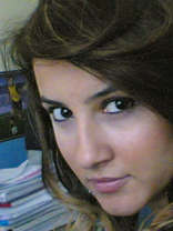 Person who looks like Delta Goodrem