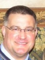 Person who looks like Drew Carey