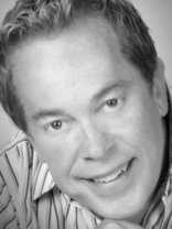 Person who looks like Tim Curry