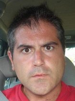 Person who looks like Greg Kinnear