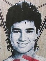 Person who looks like Mario Lopez