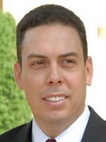 Person who looks like Tim Curry