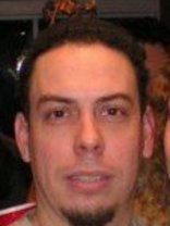 Person who looks like Tim Curry