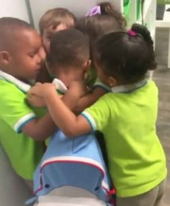 Students hug classmate after Hurricane Dorian