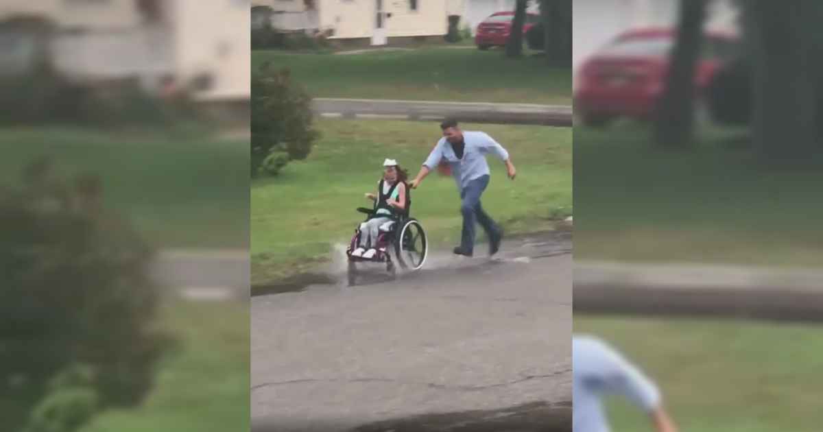 Dad Pushes Daughter In Wheelchair Through Puddles | FaithPot