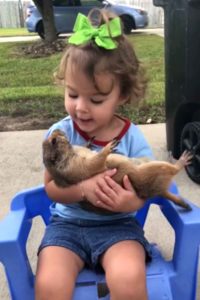 young-girl-cuddles-prairie-dog-2