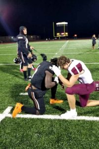 sherman-football-player-prays-with-opponent-2