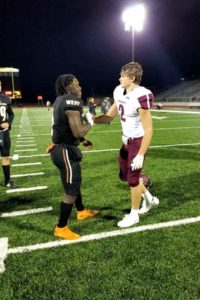 sherman-football-player-prays-with-opponent