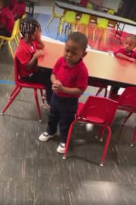 boy-praying-before-class-meal