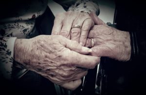 man-stands-outside-nursing-home-3