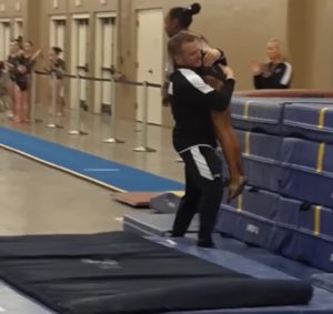 Coach-Catches-9-Year-Old-Gymnast