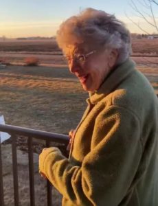 elderly-waves-at-school-bus