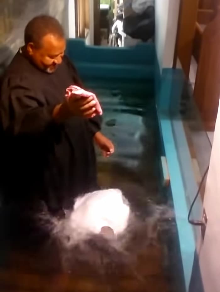 boy-baptizes-himself