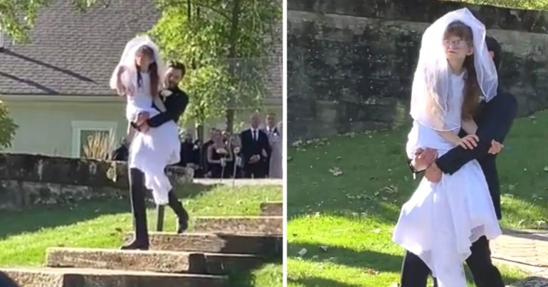 groom carries bride's sister