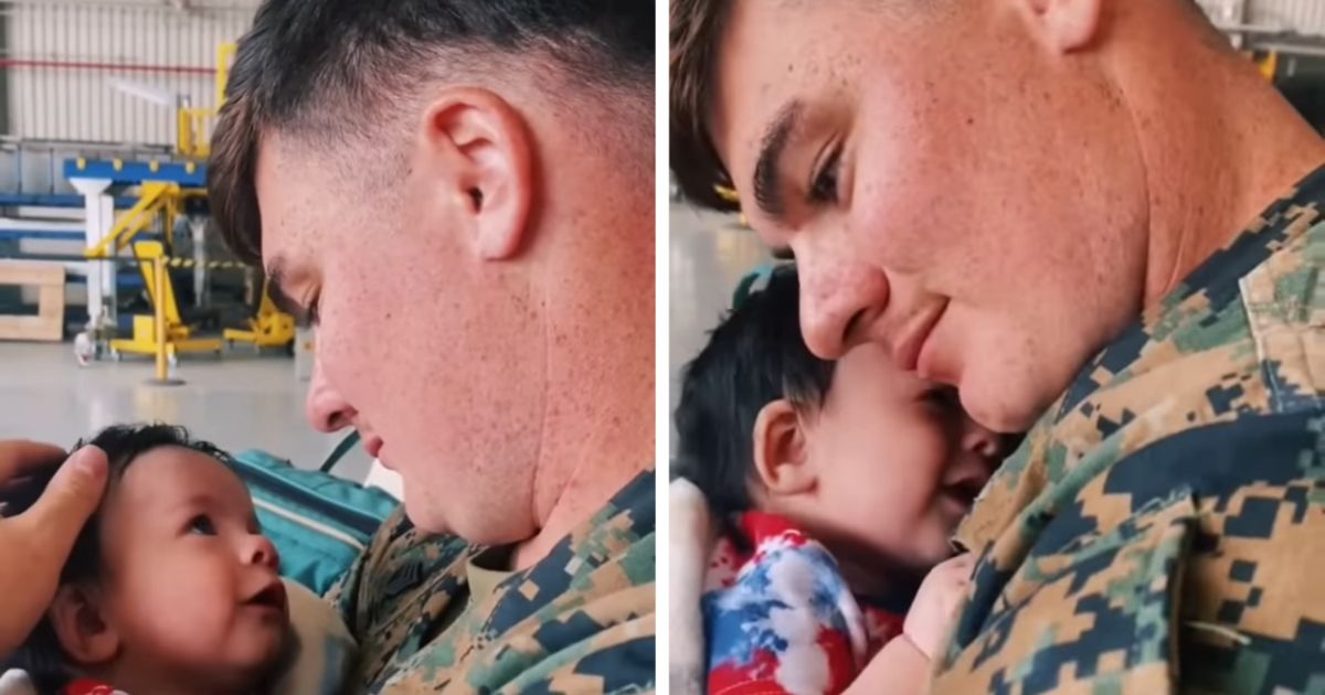 Military dad meets baby for the first time.