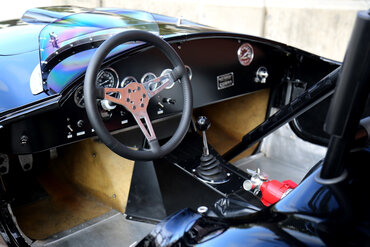 https://storage.googleapis.com/fantasy-car-photos/cars/02701/interior-8-Large__medium.JPG
