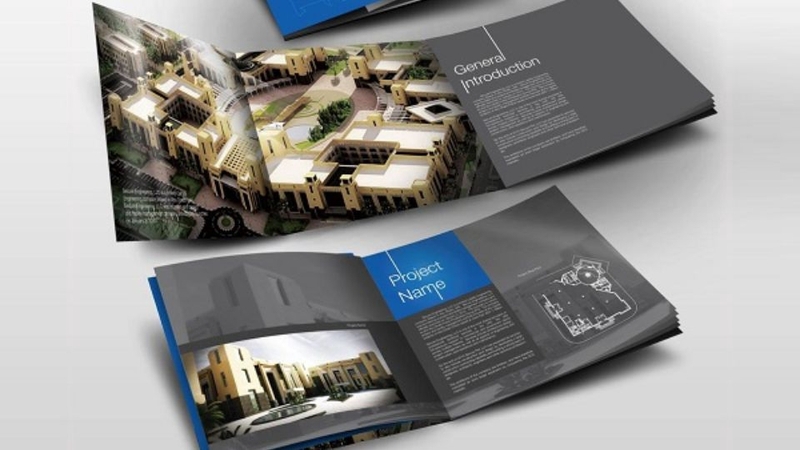 Thiết kế ấn phẩm brochure cho dự án bất động sản cao cấp với hình ảnh tòa nhà hiện đại, sang trọng.