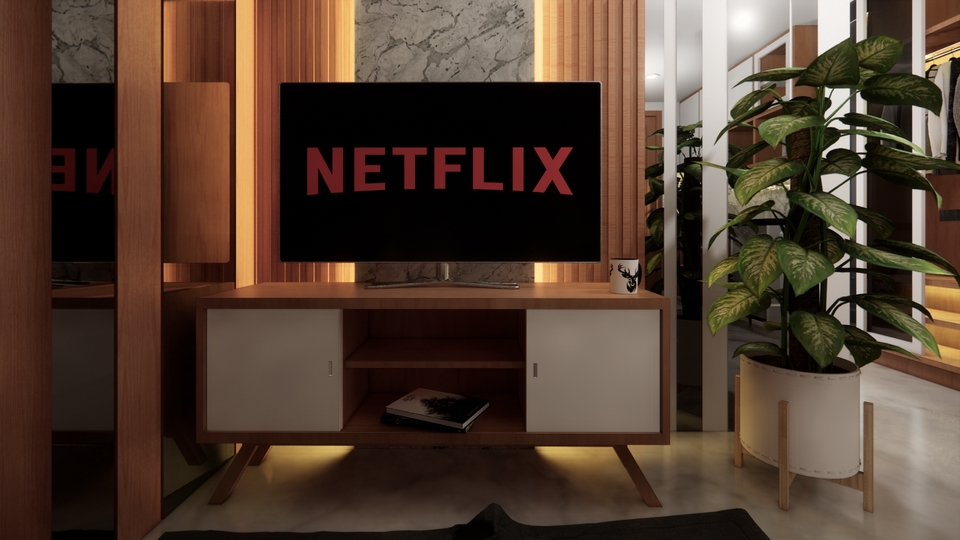 Jasa desain interior rumah minimalis modern dengan tv dan tanaman hijau di ruang tamu.