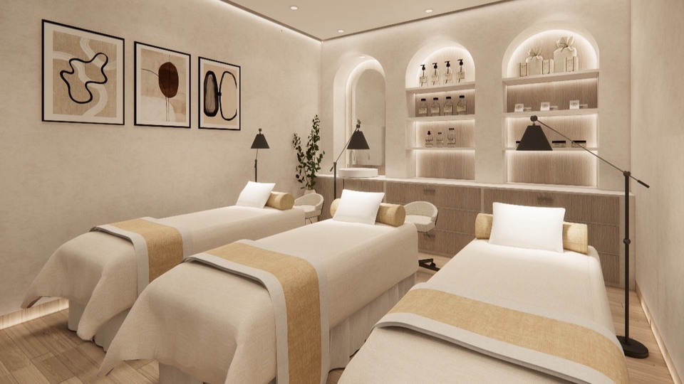 Jasa desain interior ruang spa minimalis dengan model sofa putih dan lantai kayu.