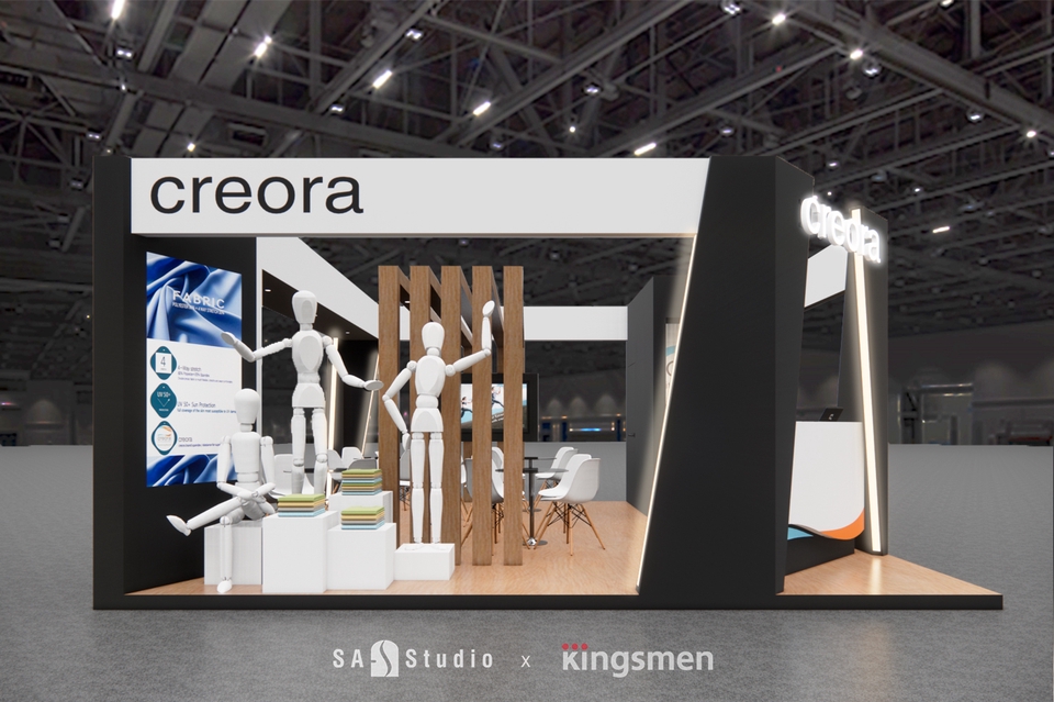 Desain Booth Pameran Creora: Contoh desain stand pameran minimalis dan modern dengan dekorasi unik, cocok untuk pameran produk tekstil dan fashion.