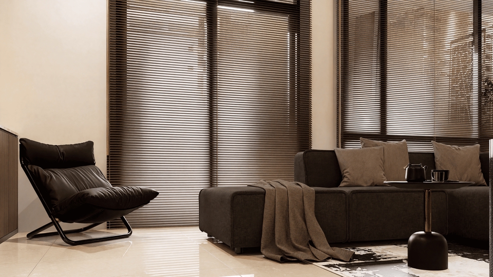 Desain interior ruang tamu modern dengan sofa hitam, kursi santai, dan jendela dengan tirai. Jasa desain interior rumah minimalis, desain interior apartemen, dan desain interior kantor.