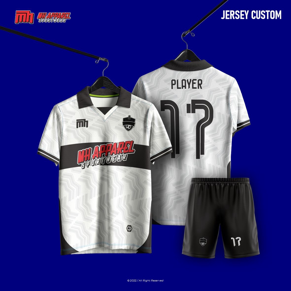 Desain jersey sepak bola putih dengan motif abstrak dan logo MH Apparel Sportwear