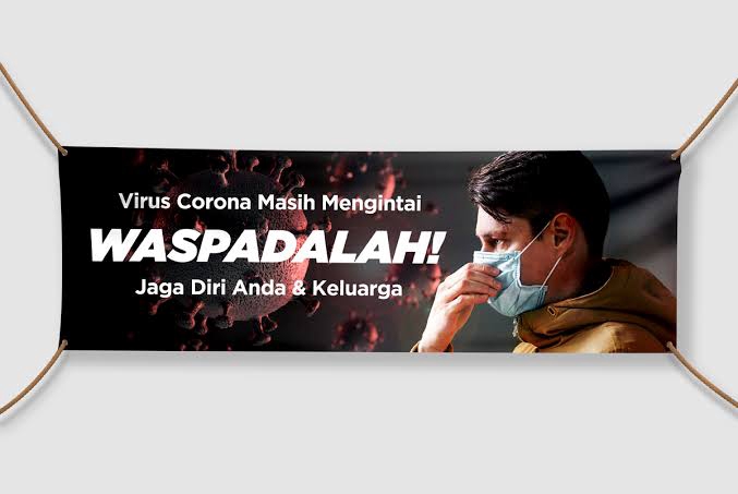 Spanduk desain dengan tema virus corona dan himbauan waspada untuk jaga diri dan keluarga.