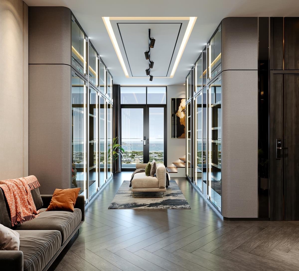 Desain interior ruang tamu minimalis dengan lemari kaca dan pintu balkon yang modern.