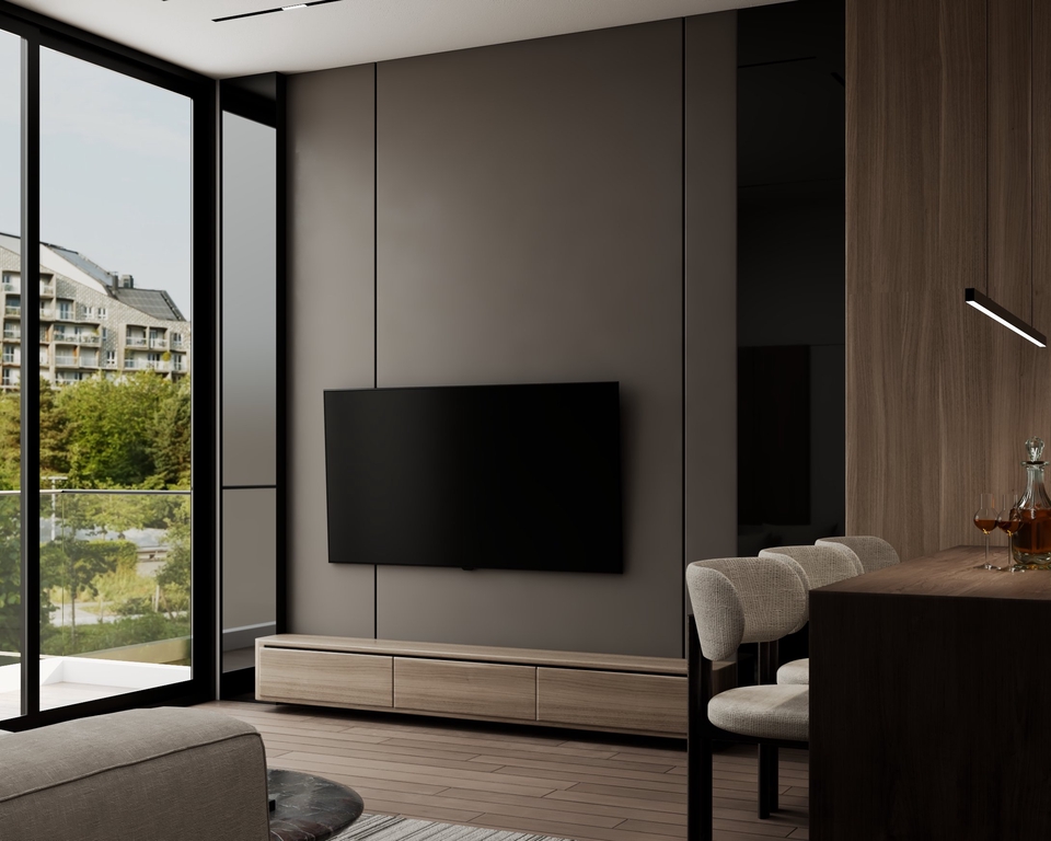 Desain interior ruang tamu modern dengan televisi dan lemari kayu.