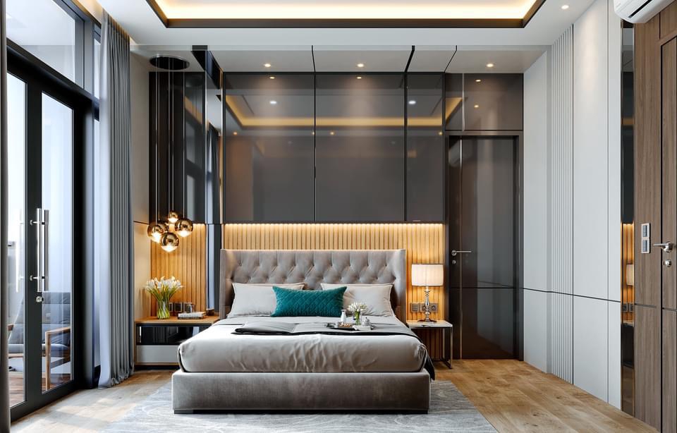 Desain kamar tidur minimalis dengan tempat tidur berlapis kain abu-abu dan rak dinding kayu, cocok untuk inspirasi desain furniture interior rumah.