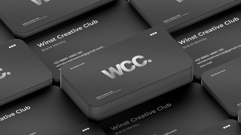Jasa branding produk dengan logo WCC dan nama "Winst Creative Club" pada kartu nama berwarna hitam