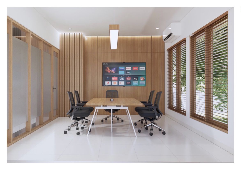 Desain interior kantor minimalis modern dengan meja kerja dan kursi putih, cocok untuk ruang rapat atau kantor kecil.