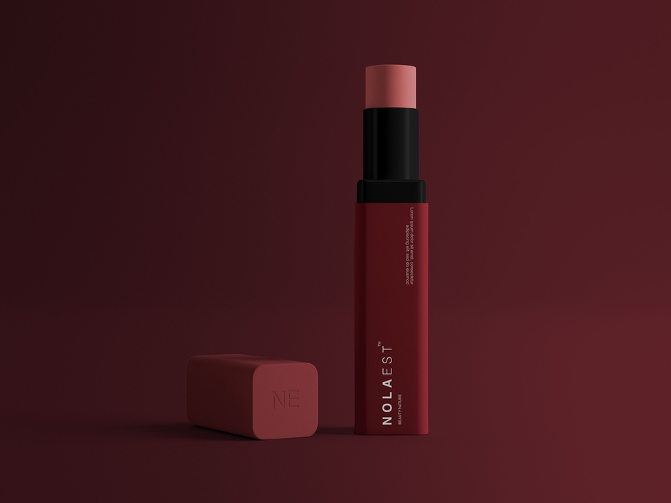 Kemasan lipstick merah dengan desain minimalis dan elegan, cocok untuk brand kecantikan.