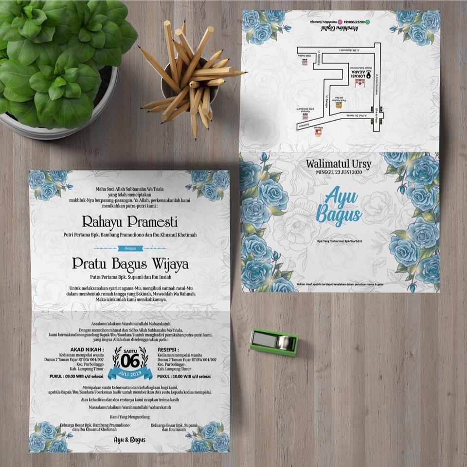 Kartu undangan pernikahan unik dengan desain biru dan putih untuk acara walimatul ursy dengan nama Rah Ayu Bagus.
