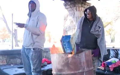 Unhoused Huddle for Warmth