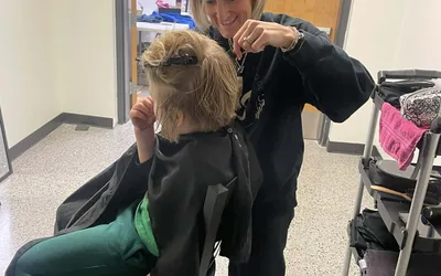 Mitchell School District Caring Closet's Cuts for Kids event