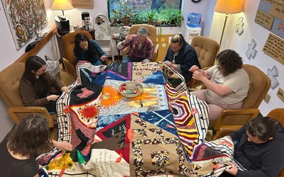 Stitching Across the Wall: A