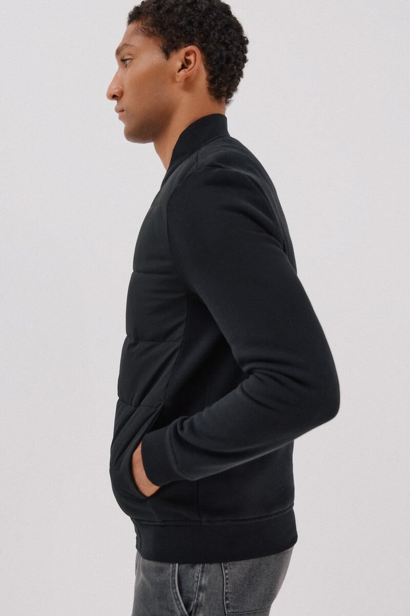 Pulovër me zinxhir, Cortefiel