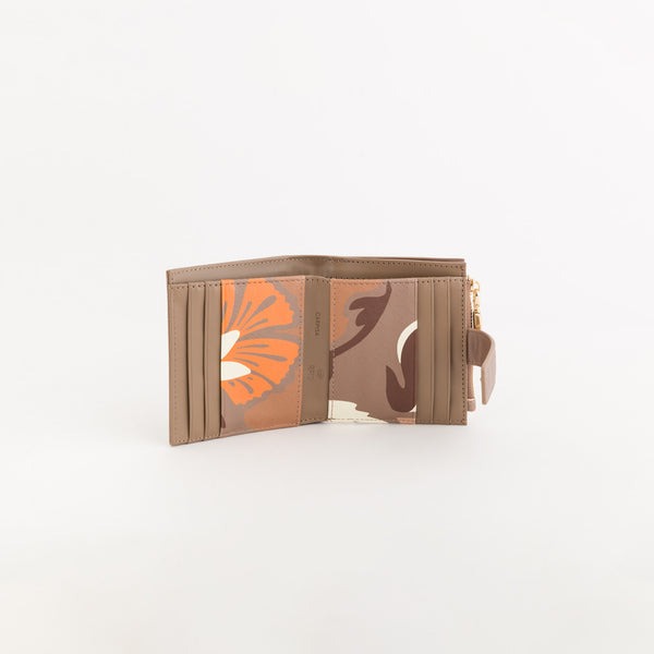 Portofol me printe, Carpisa